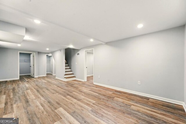 163 Oakcliff Ct, Atlanta, GA 30331 - finished basement with baseboards, stairway, light wood-style floors, and recessed lighting