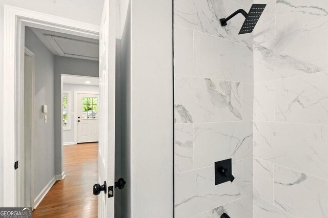 163 Oakcliff Ct, Atlanta, GA 30331 - full bathroom with a shower, wood finished floors, and baseboards