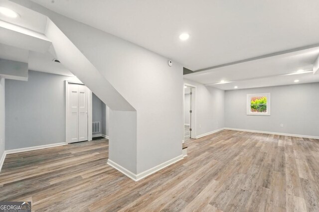 163 Oakcliff Ct, Atlanta, GA 30331 - below grade area featuring light wood-style floors, baseboards, and recessed lighting