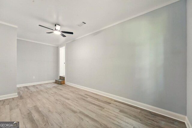 163 Oakcliff Ct, Atlanta, GA 30331 - spare room featuring ceiling fan, baseboards, wood finished floors, and crown molding