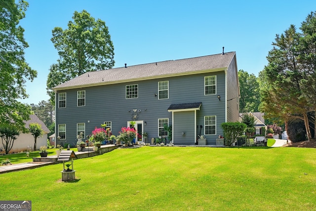 100 Chadwick Pl, Villa Rica, GA 30180 - back of house featuring a lawn