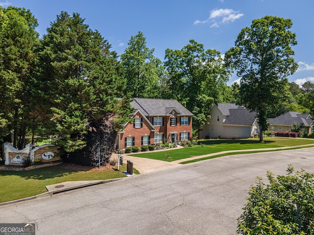 100 Chadwick Pl, Villa Rica, GA 30180 - colonial house with a front yard and brick siding