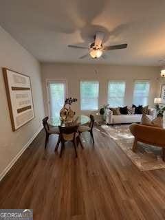 4263 Notting Hill Dr SW, Atlanta, GA 30331 - dining space featuring wood finished floors, baseboards, and a ceiling fan