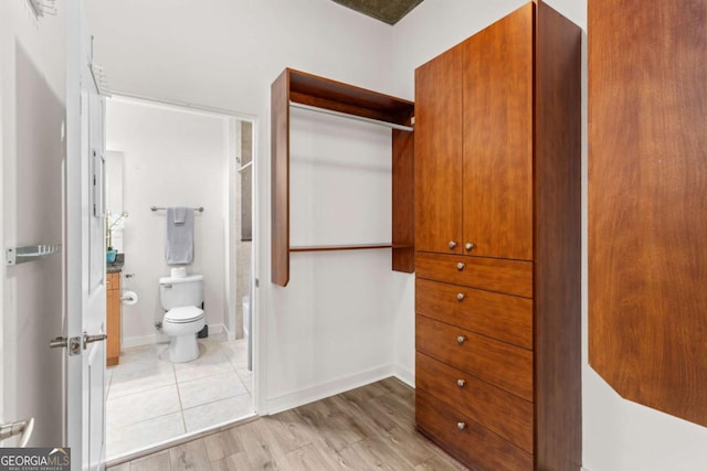 855 Peachtree St NE Unit 1508, Atlanta, GA 30308 - walk in closet featuring light wood-type flooring