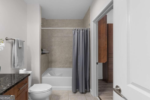 855 Peachtree St NE Unit 1508, Atlanta, GA 30308 - full bathroom with vanity, shower / bathtub combination with curtain, tile patterned flooring, and toilet