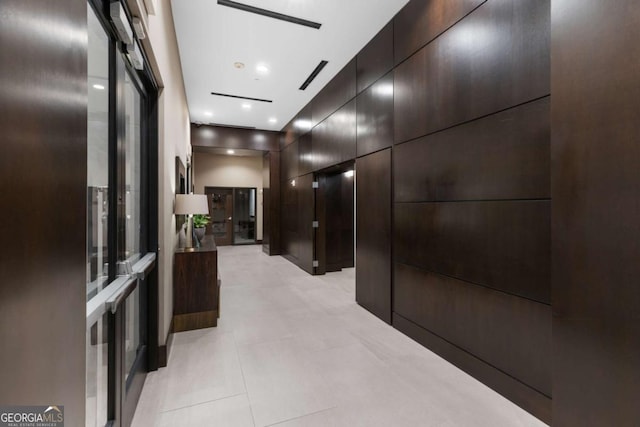 855 Peachtree St NE Unit 1508, Atlanta, GA 30308 - hallway featuring light tile patterned flooring and recessed lighting