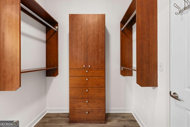 855 Peachtree St NE Unit 1508, Atlanta, GA 30308 - spacious closet featuring wood finished floors