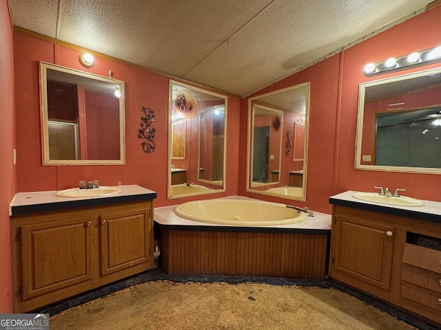 57 Pleasant Ln, Comer, GA 30629 - full bathroom with vaulted ceiling, two vanities, a textured ceiling, and a garden tub