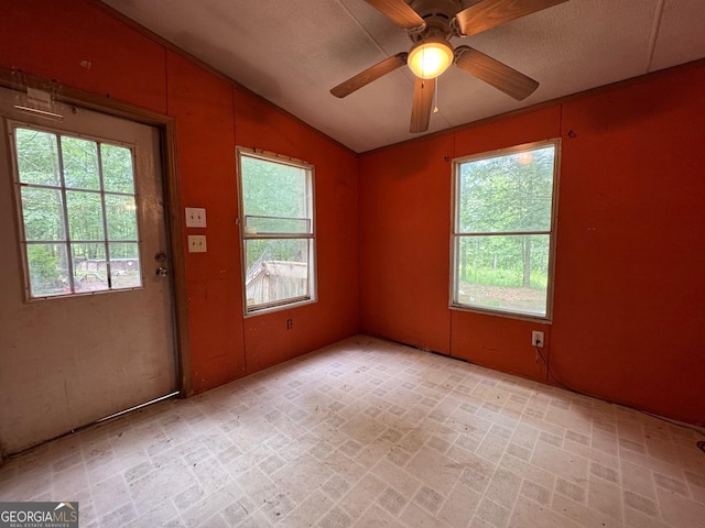 57 Pleasant Ln, Comer, GA 30629 - unfurnished room with lofted ceiling, brick patterned floors, and a ceiling fan