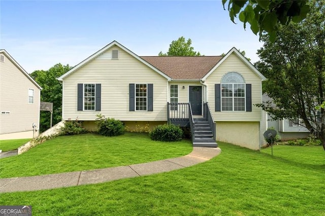 ranch-style home featuring a front lawn