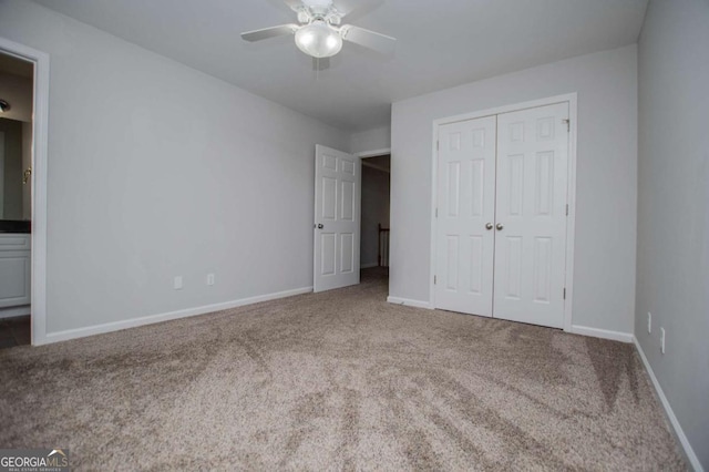 319 Stonebridge Blvd, Bremen, GA 30110 - unfurnished bedroom with carpet flooring, a closet, baseboards, and ceiling fan