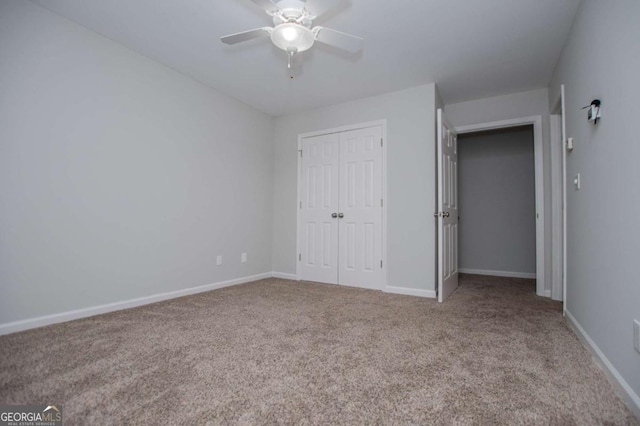 319 Stonebridge Blvd, Bremen, GA 30110 - unfurnished bedroom featuring carpet, baseboards, a closet, and a ceiling fan
