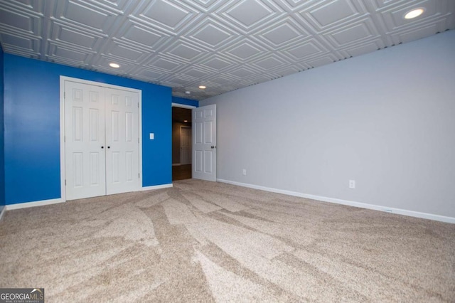319 Stonebridge Blvd, Bremen, GA 30110 - unfurnished bedroom featuring an ornate ceiling, carpet flooring, recessed lighting, a closet, and baseboards