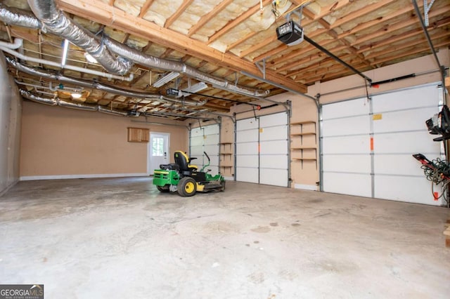 319 Stonebridge Blvd, Bremen, GA 30110 - garage with a garage door opener and baseboards