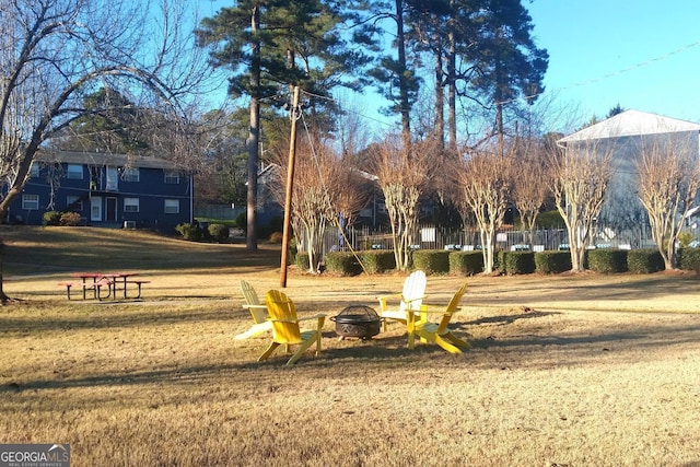 3137 Buford Hwy NE Unit 11, Brookhaven, GA 30329 - surrounding community featuring an outdoor fire pit and a lawn