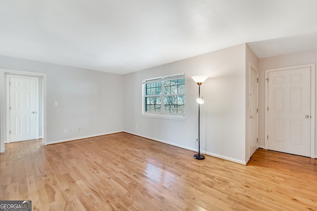 3137 Buford Hwy NE Unit 11, Brookhaven, GA 30329 - spare room featuring light wood-style flooring and baseboards