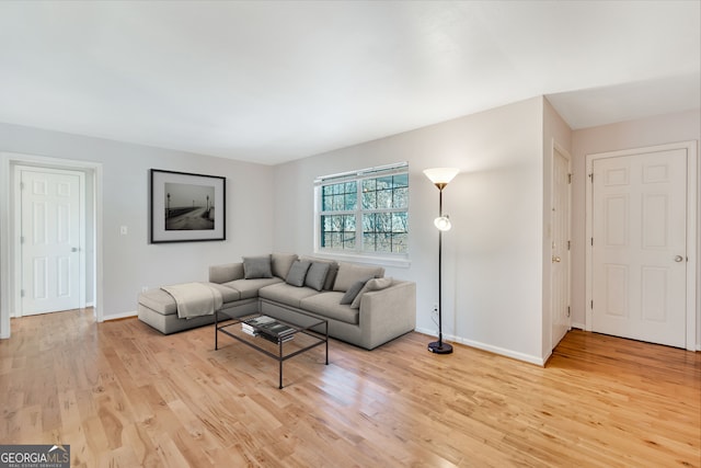 3137 Buford Hwy NE Unit 11, Brookhaven, GA 30329 - living area featuring light wood-style flooring and baseboards