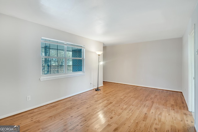 3137 Buford Hwy NE Unit 11, Brookhaven, GA 30329 - spare room with light wood-style flooring and baseboards