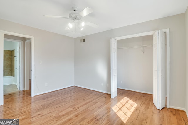 3137 Buford Hwy NE Unit 11, Brookhaven, GA 30329 - unfurnished bedroom featuring light wood-type flooring, baseboards, and a closet