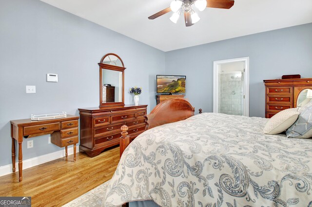 315 Antebellum Way, Fayetteville, GA 30215 - bedroom with light wood finished floors, baseboards, ceiling fan, and ensuite bathroom
