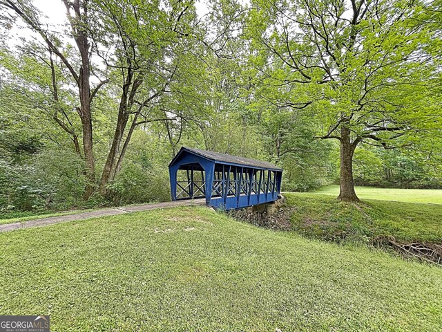 315 Antebellum Way, Fayetteville, GA 30215 - view of property's community with a yard and an outbuilding