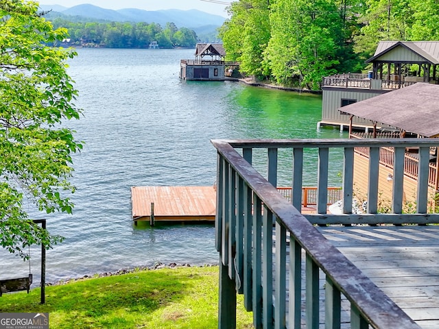 dock with a water and mountain view and a gazebo