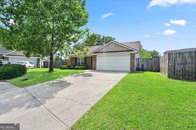162 W Tahoe Dr, Savannah, GA 31405 - view of front of home featuring an attached garage, driveway, and brick siding