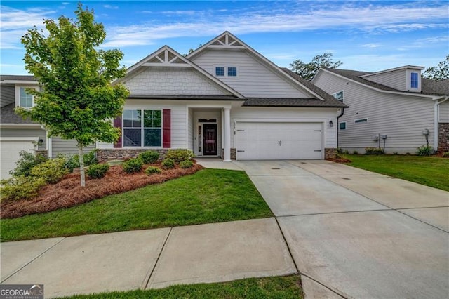178 Sunshower Rdg, Canton, GA 30114 - view of front of house with an attached garage, stone siding, driveway, and a front lawn