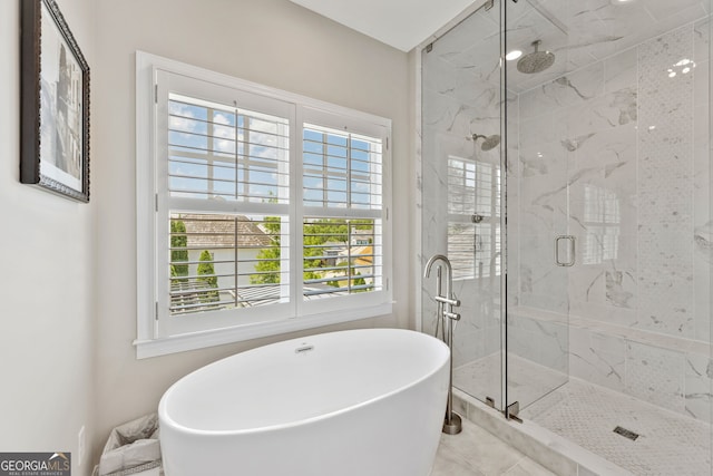 6815 Berkley Rd, Cumming, GA 30040 - bathroom featuring a marble finish shower and a soaking tub
