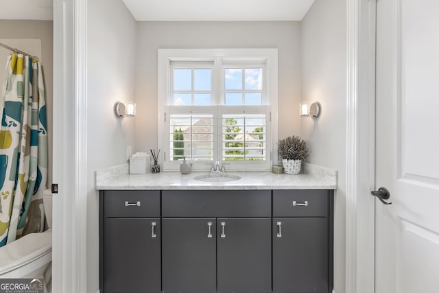 6815 Berkley Rd, Cumming, GA 30040 - full bathroom featuring vanity, toilet, and curtained shower