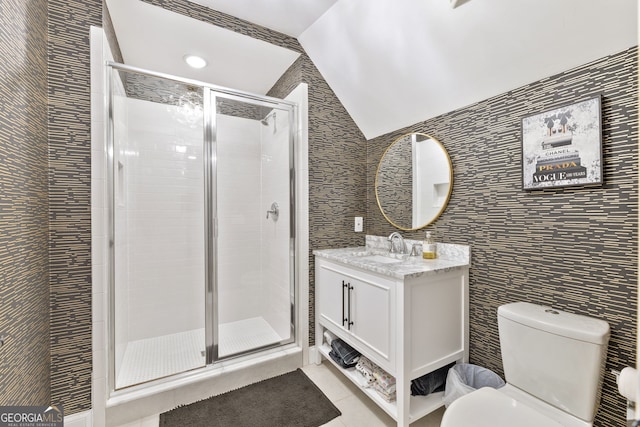 6815 Berkley Rd, Cumming, GA 30040 - full bath with toilet, a shower stall, vanity, tile patterned floors, and tile walls