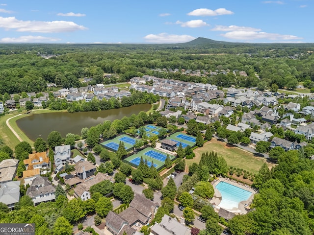 6815 Berkley Rd, Cumming, GA 30040 - aerial view of a nearby body of water, a heavily wooded area, and a pool area