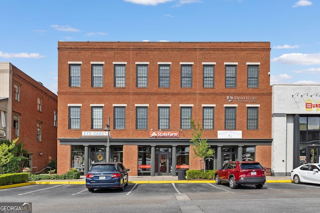 6815 Berkley Rd, Cumming, GA 30040 - view of commercial property with uncovered parking