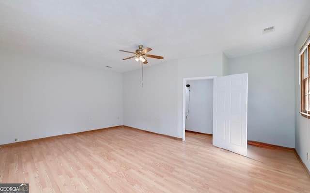 1810 King Mill Rd, Mcdonough, GA 30252 - empty room featuring a ceiling fan, light wood-style floors, and baseboards