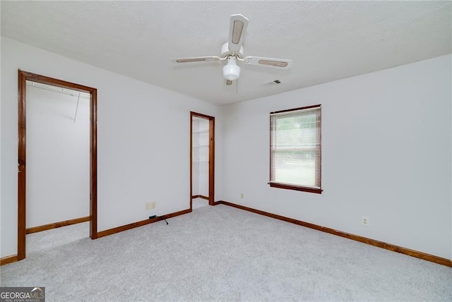 1810 King Mill Rd, Mcdonough, GA 30252 - carpeted spare room featuring baseboards and ceiling fan
