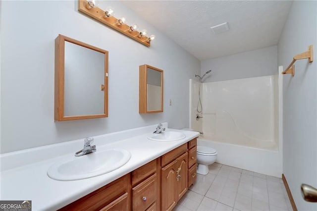1810 King Mill Rd, Mcdonough, GA 30252 - full bathroom with double vanity, toilet, tile patterned floors, and shower / washtub combination