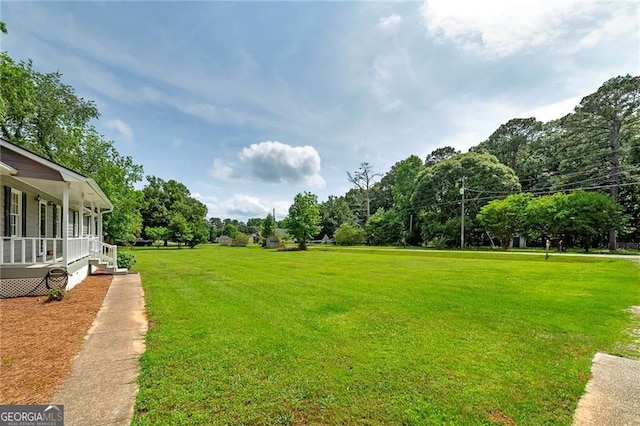 1810 King Mill Rd, Mcdonough, GA 30252 - view of grassy yard featuring covered porch