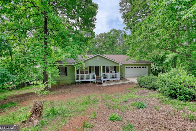 1638 River Trc, Auburn, GA 30011 - single story home with a porch, an attached garage, a chimney, and dirt driveway
