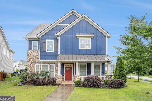 1946 Jeffery Rd NW, Atlanta, GA 30318 - craftsman-style home featuring stone siding, a front yard, and a standing seam roof