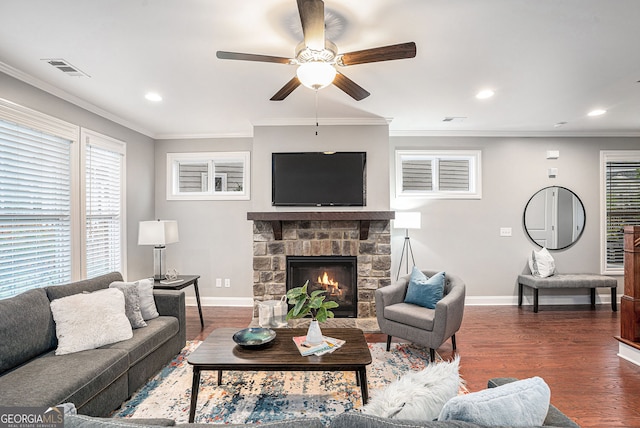 1946 Jeffery Rd NW, Atlanta, GA 30318 - living area featuring baseboards, ceiling fan, wood finished floors, a stone fireplace, and ornamental molding