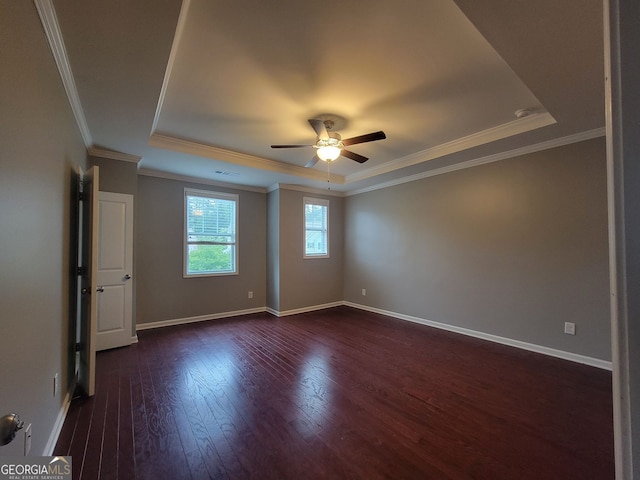 1946 Jeffery Rd NW, Atlanta, GA 30318 - spare room with a tray ceiling, ceiling fan, dark wood-style floors, crown molding, and baseboards