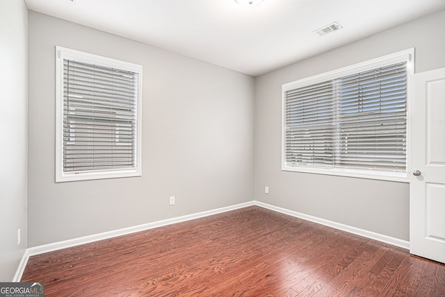 1946 Jeffery Rd NW, Atlanta, GA 30318 - empty room featuring wood finished floors and baseboards