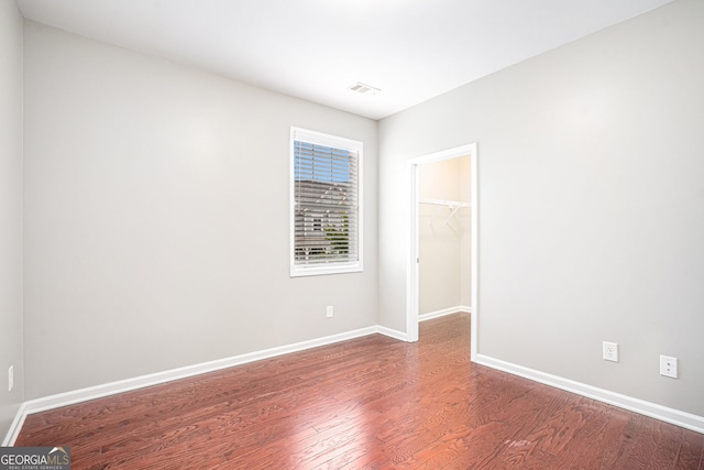 1946 Jeffery Rd NW, Atlanta, GA 30318 - unfurnished room with wood finished floors and baseboards