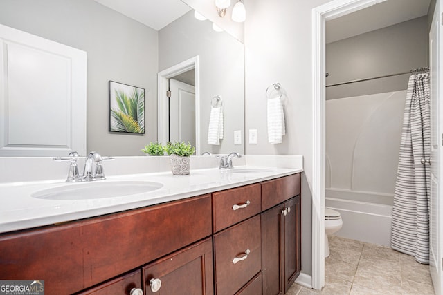 1946 Jeffery Rd NW, Atlanta, GA 30318 - bathroom with toilet, double vanity, shower / bath combination with curtain, and tile patterned flooring