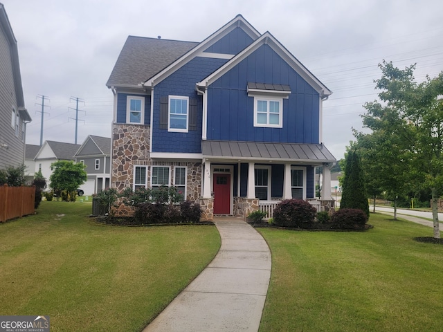 1946 Jeffery Rd NW, Atlanta, GA 30318 - view of front of property featuring a porch, board and batten siding, stone siding, and a front lawn