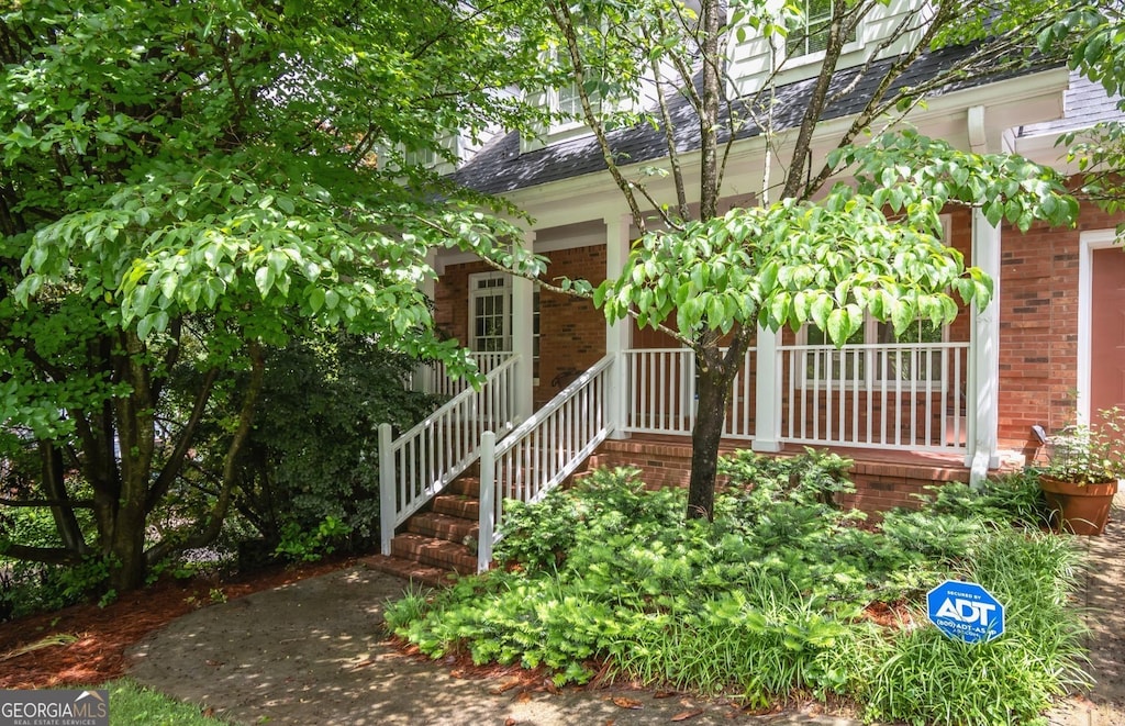 127 Chestnut Ln, Athens, GA 30606 - view of front facade with brick siding and covered porch