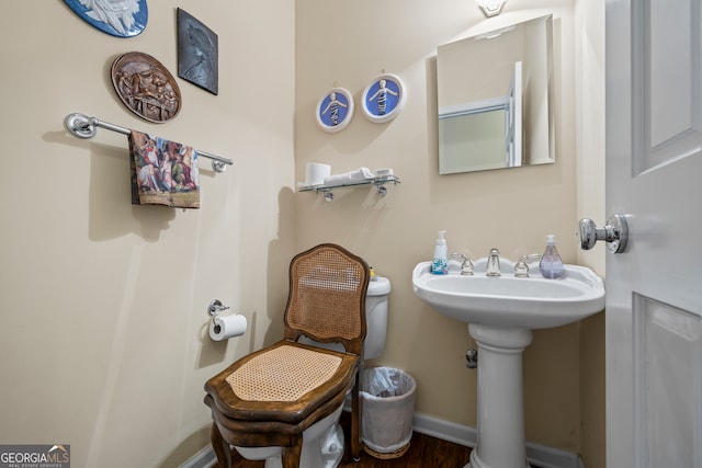 127 Chestnut Ln, Athens, GA 30606 - half bathroom with a sink and baseboards