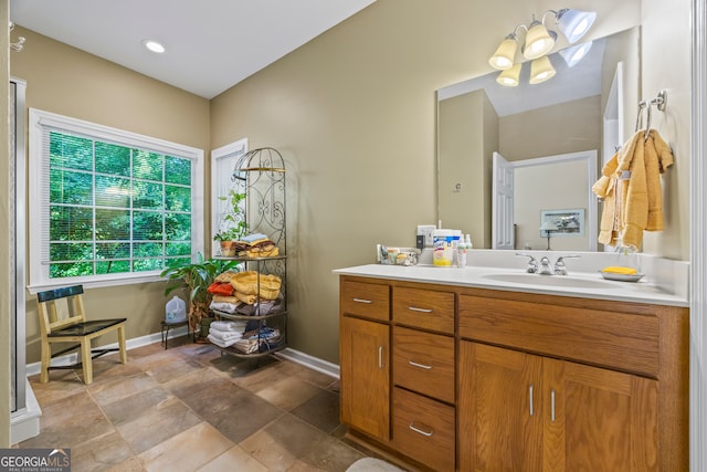 127 Chestnut Ln, Athens, GA 30606 - bathroom featuring vanity and stone finish flooring