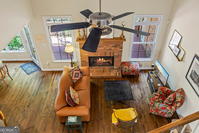 127 Chestnut Ln, Athens, GA 30606 - living room featuring ceiling fan, wood finished floors, and a fireplace