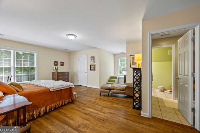 127 Chestnut Ln, Athens, GA 30606 - bedroom featuring wood finished floors and baseboards